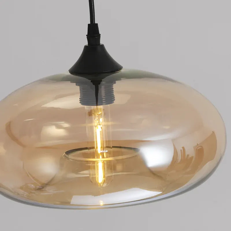 Close - up of Amber Glass Pendant Light